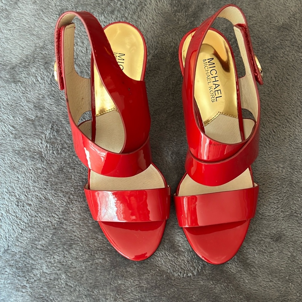 Michael Kors, with emblem. Red. With heels. Size 7M.